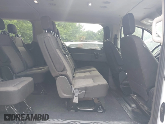 2024 Ford Transit Passenger XL with VIN 1FBAX2YG6RKA47052, listed as a IAAI auction lot 42500436 with 40,965 mi miles and . Bid and sale history available at DreamBid. Image 8.