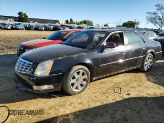 2007 Cadillac DTS V8 z VIN 1G6KD57Y07U137452, wystawiony jako Copart lot #87670235 z przebiegiem 91 532 mil mil oraz Tytuł czysty. Historia ofert i sprzedaży dostępna na DreamBid. Obrazek 1.