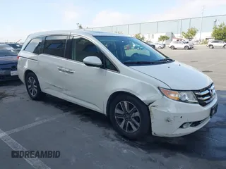 2015 Honda Odyssey Touring Elite with VIN 5FNRL5H9XFB102222, listed as a IAAI auction lot 42485059 with 123,562 mi miles and . Bid and sale history available at DreamBid. Image 1.
