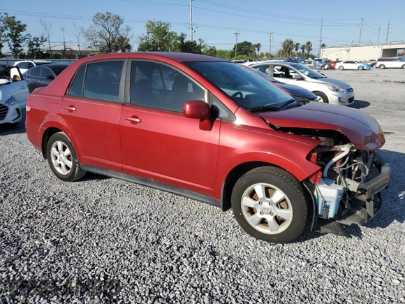 2010 Nissan Versa S with VIN 3N1BC1AP6AL443004, listed as a Copart auction lot 52010495 with 118,801 mi miles and Non Repairable. Bid and sale history available at DreamBid. Image 4.