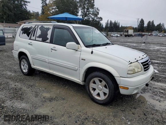 2002 Suzuki XL7 Standard z VIN JS3TX92V224107876, wystawiony jako Copart lot #78257934 z przebiegiem 142 177 mil mil oraz Czysty tytuł • Clean title. Historia ofert i sprzedaży dostępna na DreamBid. Obrazek 4.