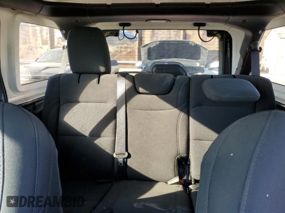 2020 Jeep Wrangler Unlimited Willys with VIN 1C4HJXDG5LW348507, listed as a Copart auction lot 77000574 with 57,056 mi miles and Salvage title. Bid and sale history available at DreamBid. Image 10.