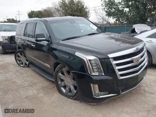 2018 Cadillac Escalade Luxury with VIN 1GYS4BKJ3JR143952, listed as a IAAI auction lot 41333902 with 124,265 mi miles. Bid and sale history available at carsss.com. Image 1.