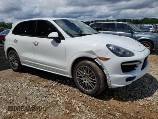 2014 Porsche Cayenne GTS с VIN WP1AD2A27ELA70118, выставлен на аукционе Copart как лот 56405945 с пробегом 179 529 миль миль и Списание • Salvage title. История ставок и продаж доступна на DreamBid. Изображение 4.