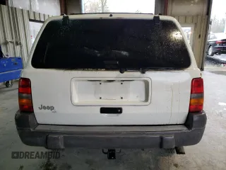 1998 Jeep Grand Cherokee Laredo with VIN 1J4GZ58S2WC222595, listed as a Copart auction lot 51108625 with 0 mi miles and Salvage Title. Bid and sale history available at carsss.com. Image 6.