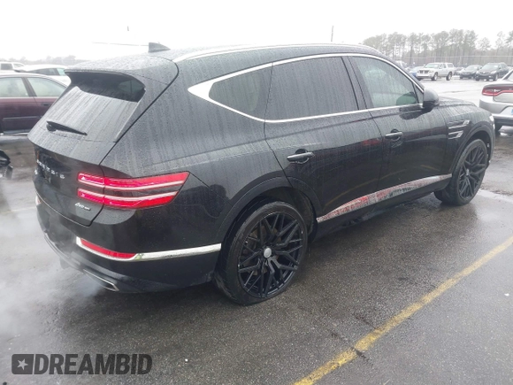 2022 Genesis GV80 with VIN KMUHCESC0NU083778, listed as a IAAI auction lot 41553215 with 93,384 mi miles and . Bid and sale history available at DreamBid. Image 4.