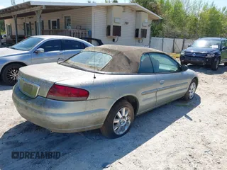 2004 Chrysler Sebring Limited with VIN 1C3EL65R74N171865, listed as a IAAI auction lot 41996305 with 151,613 mi miles and . Bid and sale history available at DreamBid. Image 4.