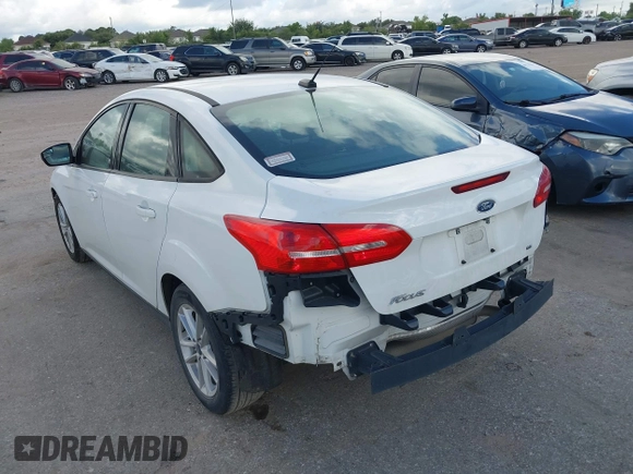 2017 Ford Focus SE with VIN 1FADP3F28HL285649, listed as a IAAI auction lot 39718289 with 118,366 mi miles and . Bid and sale history available at DreamBid. Image 3.