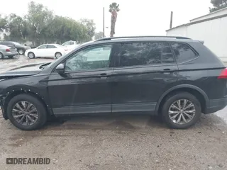 2018 Volkswagen Tiguan S with VIN 3VV1B7AX0JM101932, listed as a IAAI auction lot 41725112 with 143,780 mi miles. Bid and sale history available at carsss.com. Image 14.