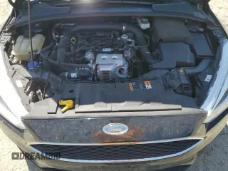 2018 Ford Focus SE with VIN 1FADP3FE8JL205699, listed as a Copart auction lot 63300795 with 128,877 mi miles and Clean title. Bid and sale history available at DreamBid. Image 11.