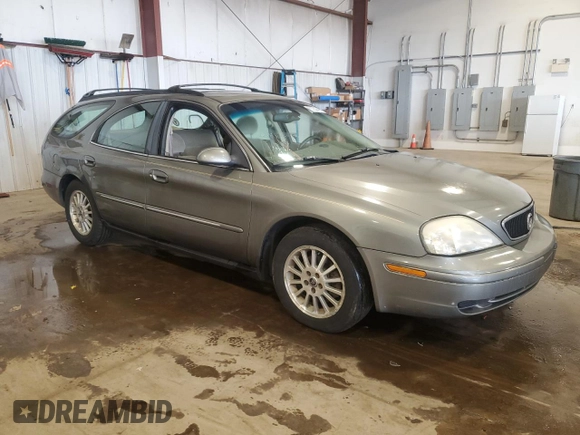 2002 Mercury Sable with VIN 1MEFM58U82G612541, listed as a Copart auction lot 60254405 with 171,854 mi miles and Salvage title. Bid and sale history available at DreamBid. Image 4.