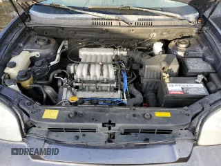 2005 Hyundai Santa Fe GLS with VIN KM8SC73D45U987706, listed as a Copart auction lot 77706174 with 160,646 mi miles and Salvage Title. Bid and sale history available at carsss.com. Image 12.