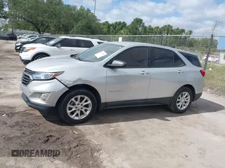 2018 Chevrolet Equinox LS with VIN 2GNAXHEV1J6110087, listed as a IAAI auction lot 42175959 with 124,611 mi miles and . Bid and sale history available at DreamBid. Image 14.