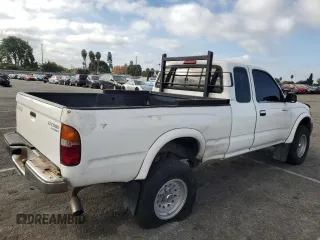 1999 Toyota Tacoma PreRunner with VIN 4TASM92NXXZ476400, listed as a Copart auction lot 81001204 with 280,797 mi miles and Salvage title. Bid and sale history available at DreamBid. Image 3.