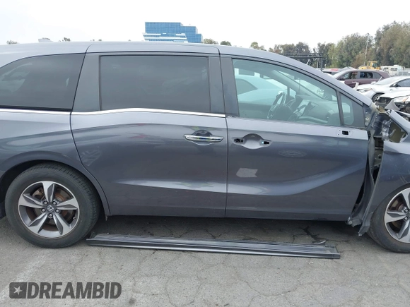 2018 Honda Odyssey Touring with VIN 5FNRL6H88JB062213, listed as a IAAI auction lot 42489379 with 90,578 mi miles and . Bid and sale history available at DreamBid. Image 14.