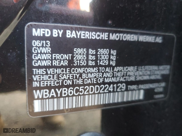 2013 BMW 7 Series 750i xDrive with VIN WBAYB6C52DD224129, listed as a Copart auction lot 52752605 with 122,275 mi miles and Clean Title. Bid and sale history available at carsss.com. Image 12.