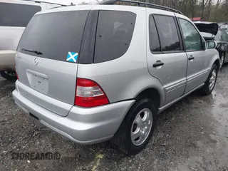 2002 Mercedes-Benz M-Class with VIN 4JGAB54E92A352889, listed as a IAAI auction lot 41805001 with 174,758 mi miles. Bid and sale history available at carsss.com. Image 4.