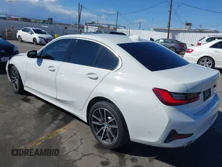 2020 BMW 3 Series 330i with VIN 3MW5R1J02L8B31552, listed as a IAAI auction lot 41760488 with 32,918 mi miles. Bid and sale history available at carsss.com. Image 3.