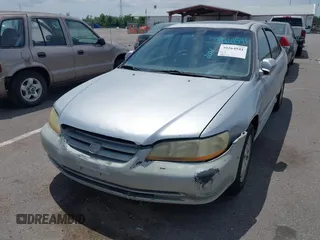 2001 Honda Accord EX z VIN 1HGCG165X1A058857, wystawiony jako IAAI lot #39264541 z przebiegiem 184 645 mil mil oraz . Historia ofert i sprzedaży dostępna na DreamBid. Obrazek 6.