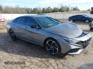 2023 Hyundai Elantra N Line z VIN KMHLR4AF6PU514088, wystawiony jako IAAI lot #41633101 z przebiegiem 49 185 mil mil oraz . Historia ofert i sprzedaży dostępna na DreamBid. Obrazek 1.
