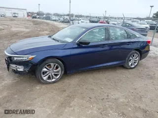 2018 Honda Accord Sedan LX 1.5T with VIN 1HGCV1F18JA042031, listed as a IAAI auction lot 41828316 with 130,864 mi miles. Bid and sale history available at carsss.com. Image 2.