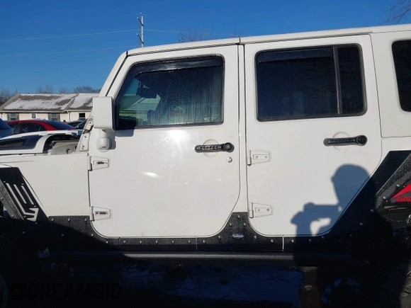 2014 Jeep Wrangler Unlimited Sahara with VIN 1C4HJWEG2EL273813, listed as a IAAI auction lot 41311011 with 96,104 mi miles. Bid and sale history available at carsss.com. Image 14.