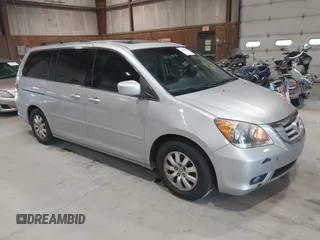 2010 Honda Odyssey EX-L z VIN 5FNRL3H75AB009698, wystawiony jako IAAI lot #42855966 z przebiegiem 215 138 mil mil oraz . Historia ofert i sprzedaży dostępna na DreamBid. Obrazek 1.