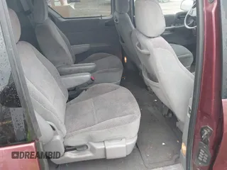 2000 Ford Windstar SE z VIN 2FMZA5242YBA26977, wystawiony jako IAAI lot #41499880 z przebiegiem Nie podano mil oraz . Historia ofert i sprzedaży dostępna na DreamBid. Obrazek 8.