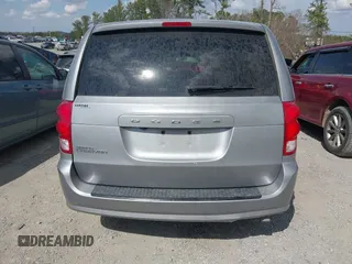 2015 Dodge Grand Caravan American Value with VIN 2C4RDGBG6FR576897, listed as a IAAI auction lot 41780897 with 159,823 mi miles and . Bid and sale history available at DreamBid. Image 16.