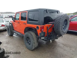2015 Jeep Wrangler Unlimited Sahara with VIN 1C4BJWEG6FL603265, listed as a IAAI auction lot 41956606 with 70,983 mi miles. Bid and sale history available at carsss.com. Image 3.