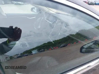 2013 Tesla Model S с VIN 5YJSA1CN1DFP08848, выставлен на аукционе IAAI как лот 42300243 с пробегом Не указан миль и . История ставок и продаж доступна на DreamBid. Изображение 5.