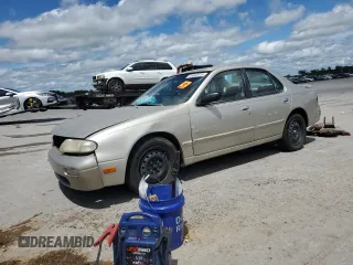1996 Nissan Altima XE z VIN 1N4BU31DXTC195033, wystawiony jako Copart lot #56692915 z przebiegiem 142 691 mil mil oraz Szkoda całkowita • Salvage title. Historia ofert i sprzedaży dostępna na DreamBid. Obrazek 1.