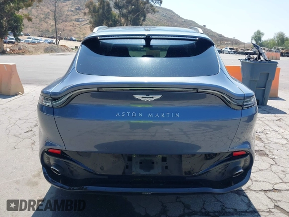 2021 Aston Martin DBX z VIN SCFVUJAW8MTV02568, wystawiony jako IAAI lot #42183964 z przebiegiem 53 608 mil mil oraz . Historia ofert i sprzedaży dostępna na DreamBid. Obrazek 16.