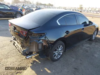 2024 Mazda 3 S with VIN 3MZBPAAMXRM423154, listed as a IAAI auction lot 41969779 with 3,046 mi miles and . Bid and sale history available at DreamBid. Image 4.