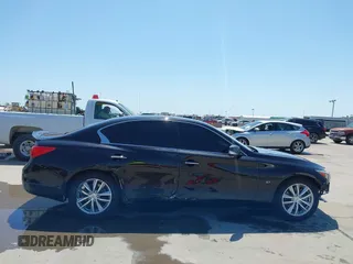 2015 Infiniti Q50 Premium with VIN JN1BV7AP9FM355526, listed as a IAAI auction lot 42010401 with 67,131 mi miles. Bid and sale history available at carsss.com. Image 14.