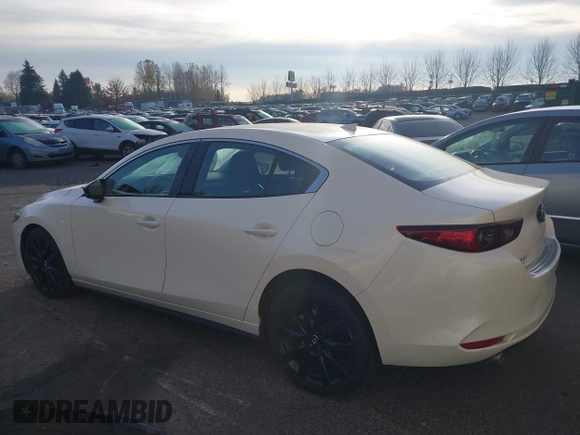 2022 Mazda 3 2.5 Turbo with VIN 3MZBPBAY2NM311824, listed as a IAAI auction lot 41038030 with 21,669 mi miles and . Bid and sale history available at DreamBid. Image 3.