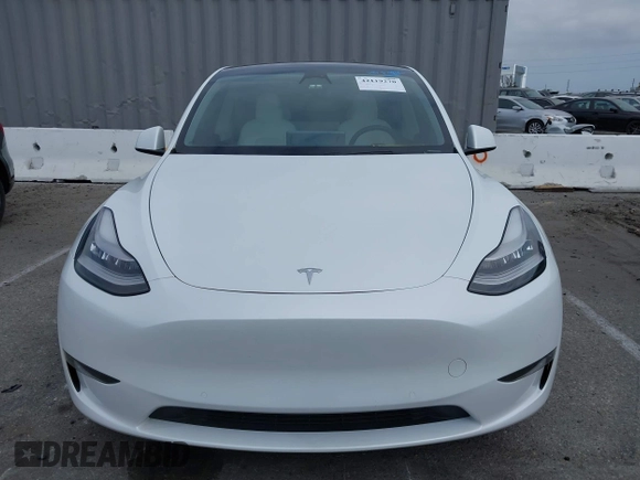 2021 Tesla Model Y Long Range with VIN 5YJYGDEE3MF081304, listed as a IAAI auction lot 42119270 with 90,521 mi miles. Bid and sale history available at carsss.com. Image 12.
