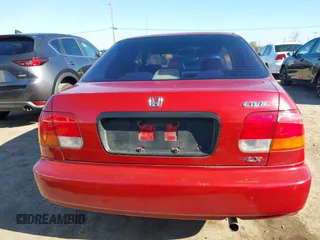 1997 Honda Civic LX with VIN 1HGEJ6678VL030963, listed as a IAAI auction lot 41880866 with 142,472 mi miles. Bid and sale history available at carsss.com. Image 16.