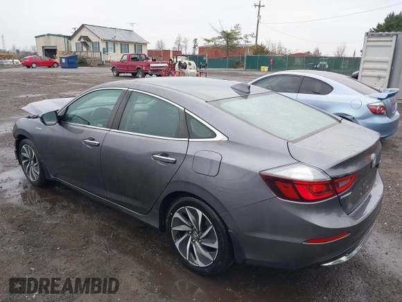 2020 Honda Insight Touring with VIN 19XZE4F98LE011149, listed as a IAAI auction lot 41834043 with 54,251 mi miles and . Bid and sale history available at carsss.com. Image 3.