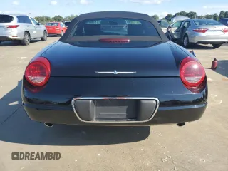 2002 Ford Thunderbird Hardtop Premium z VIN 1FAHP60A52Y122437, wystawiony jako Copart lot #73883244 z przebiegiem Nie podano mil oraz Nie do naprawy • Non repairable. Historia ofert i sprzedaży dostępna na DreamBid. Obrazek 6.