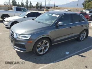 2018 Audi Q3 Premium Plus z VIN WA1JCCFS5JR028633, wystawiony jako Copart lot #51811895 z przebiegiem 51 925 mil mil oraz Szkoda całkowita • Salvage title. Historia ofert i sprzedaży dostępna na DreamBid. Obrazek 1.