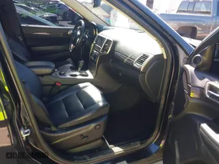 2011 Jeep Grand Cherokee Laredo with VIN 1J4RR4GG0BC656301, listed as a IAAI auction lot 41894106 with 95,293 mi miles. Bid and sale history available at carsss.com. Image 5.