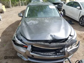2015 Infiniti Q50 Premium z VIN JN1BV7AR1FM398047, wystawiony jako IAAI lot #42203862 z przebiegiem 104 002 mil mil oraz . Historia ofert i sprzedaży dostępna na DreamBid. Obrazek 12.