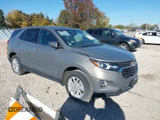 2018 Chevrolet Equinox LT z VIN 3GNAXSEV7JS621706, wystawiony jako IAAI lot #40760827 z przebiegiem 36 051 mil mil oraz . Historia ofert i sprzedaży dostępna na DreamBid. Obrazek 1.
