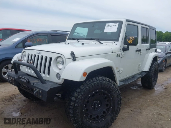 2015 Jeep Wrangler Unlimited Sahara с VIN 1C4BJWEG1FL506393, выставлен на аукционе IAAI как лот 42326900 с пробегом 100 538 миль миль и . История ставок и продаж доступна на DreamBid. Изображение 2.