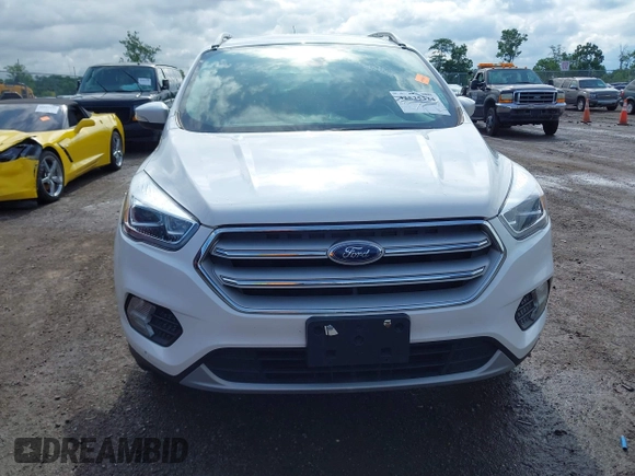 2019 Ford Escape Titanium with VIN 1FMCU9J98KUA95238, listed as a IAAI auction lot 42525324 with 59,222 mi miles and . Bid and sale history available at DreamBid. Image 12.