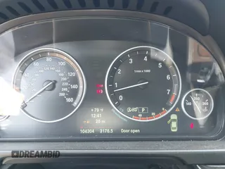 2014 BMW 5 Series 535i xDrive with VIN WBA5B3C57ED531072, listed as a IAAI auction lot 42574991 with 104,304 mi miles and . Bid and sale history available at DreamBid. Image 7.