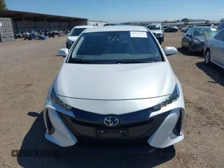 2021 Toyota Prius LE with VIN JTDKAMFP2M3184900, listed as a IAAI auction lot 42014569 with 81,563 mi miles and . Bid and sale history available at DreamBid. Image 12.