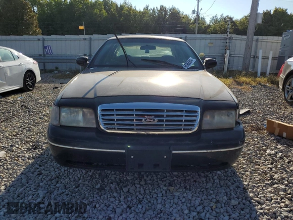 2002 Ford Crown Victoria Police z VIN 2FAFP71W52X157857, wystawiony jako Copart lot #65963304 z przebiegiem 203 427 mil mil oraz Tytuł czysty. Historia ofert i sprzedaży dostępna na DreamBid. Obrazek 5.
