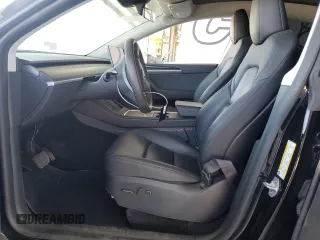 2024 Tesla Model Y Long Range с VIN 7SAYGDEE8RF983280, выставлен на аукционе Copart как лот 55417555 с пробегом 52 273 миль миль и Списание • Salvage title. История ставок и продаж доступна на DreamBid. Изображение 7.